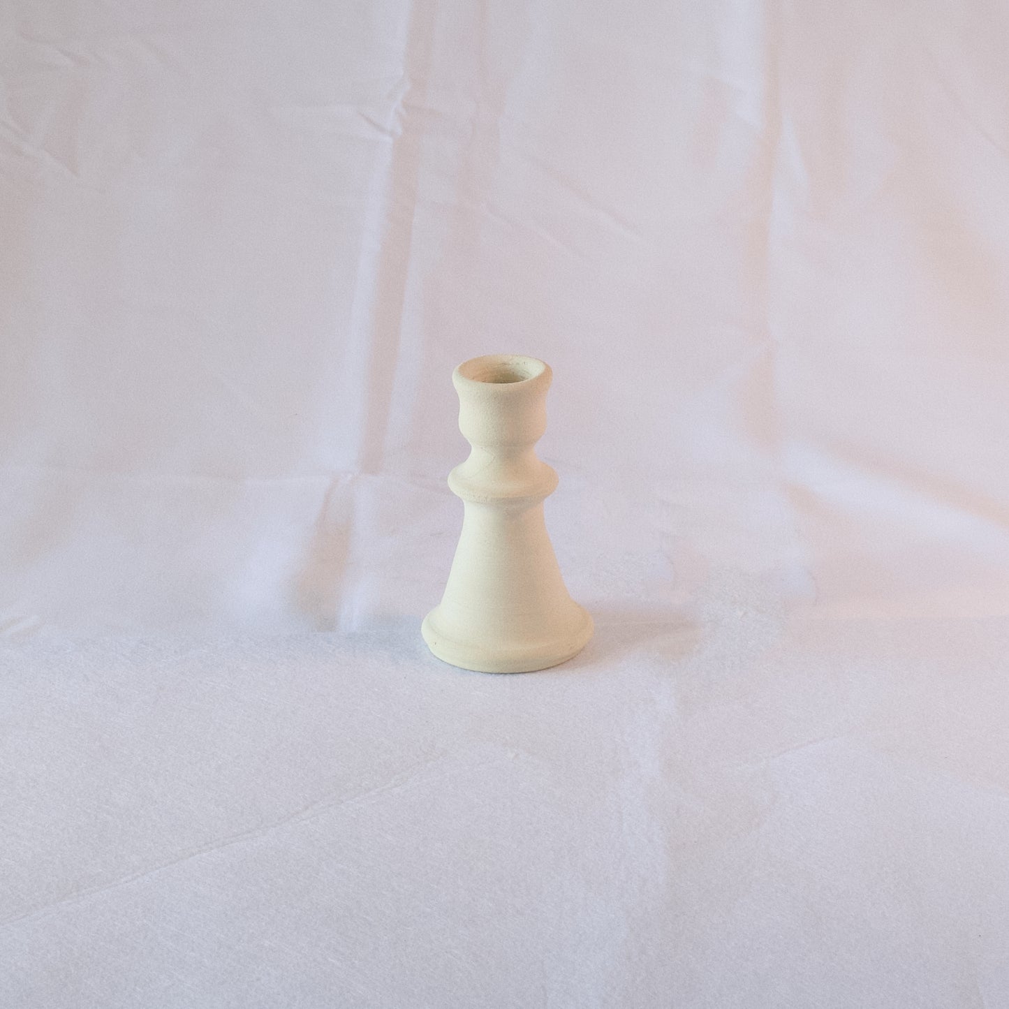 White ceramic candle holder